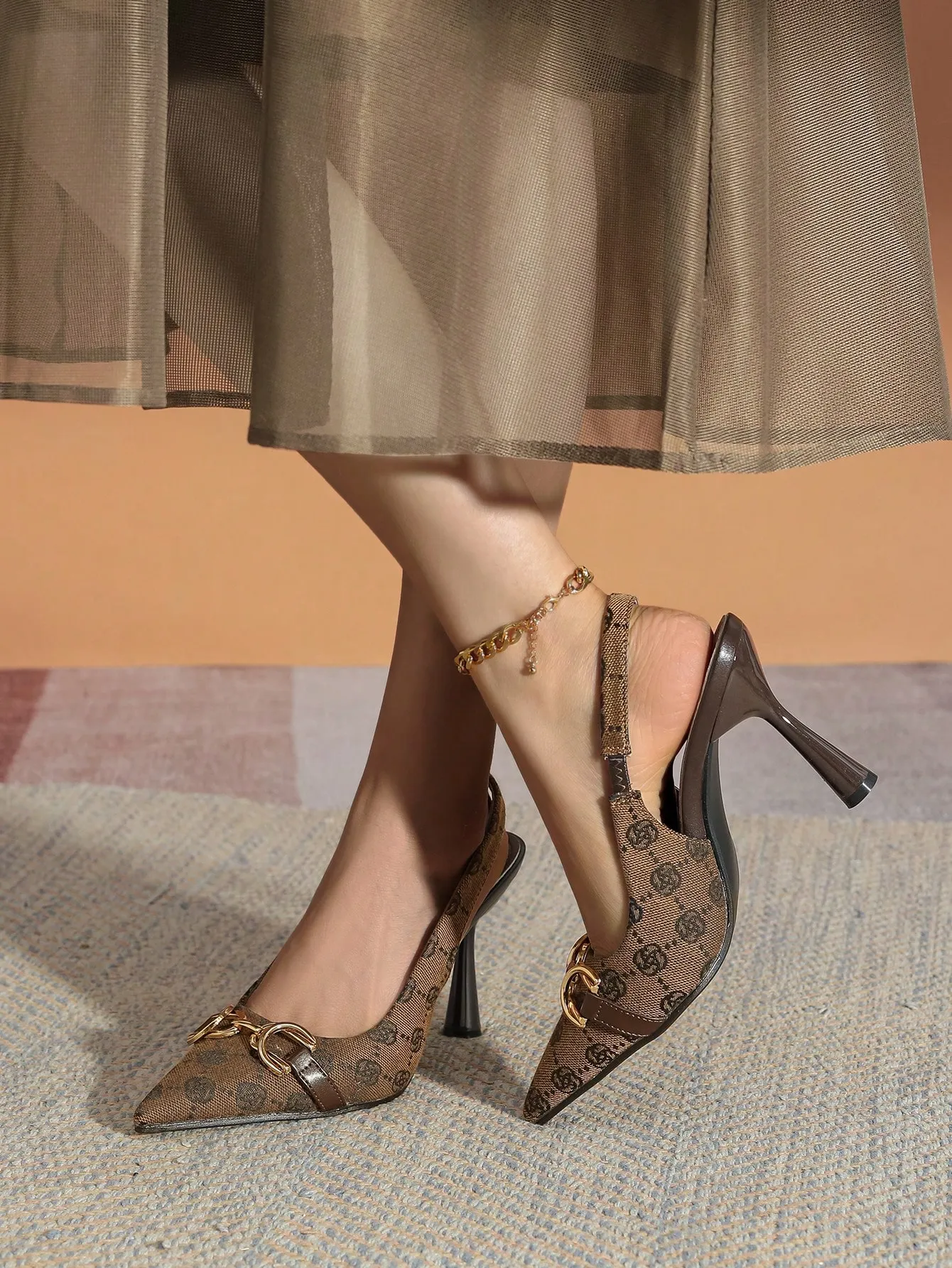 Regal Monogram Slingback Pumps