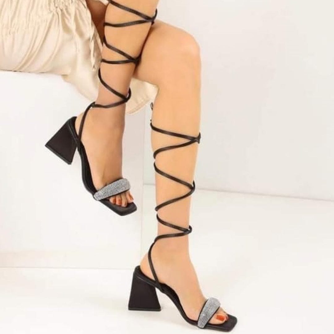 Black strappy leg heels